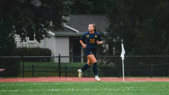 Sophia Nickel runs down the field in a match at Iowa State on Sept. 27.