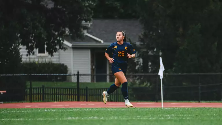 Sophia Nickel runs down the field in a match at Iowa State on Sept. 27.