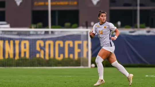 Maria Delyannis runs down the field during a match at Dick Dlesk Soccer Stadium.