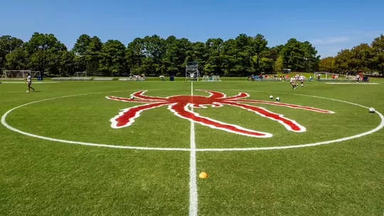 Photo of President's Field with a red Spider in the middle