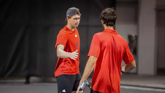 Davis Wiley high fiving cole brashear