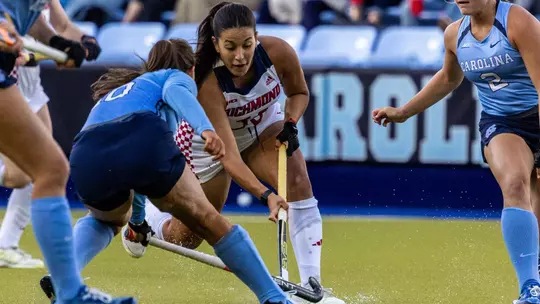 Spider Hockey's Valen Luna Paratore drives through the UNC defense