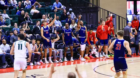Spiders bench reacts after a three-pointer