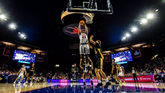 Jaylen Robins skies for a slam dunk vs ECU