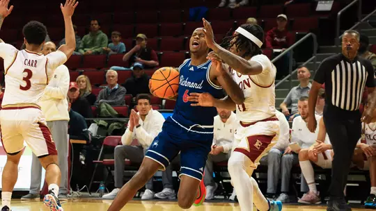 AJ Lopez is fouled while driving to the basket