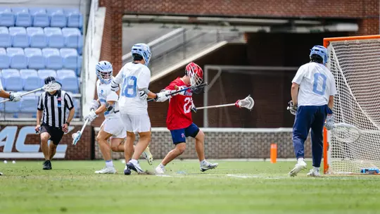 The University of Richmond men's lacrosse team made history by securing its first-ever NCAA Tournament victory with a 13-10 win over eighth-seeded North Carolina on May 10, 2025 in Chapel Hill, N.C.