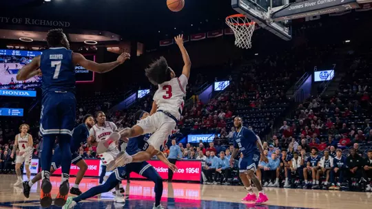 Aiden Argabright shoots a floater vs Rhode Island