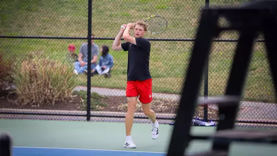 Davis Wiley after hitting a tennis ball