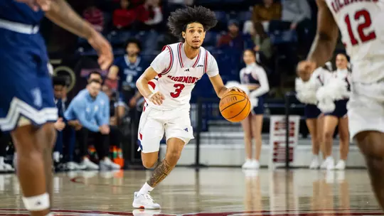 Aiden Argabright dribbles the ball quickly up court