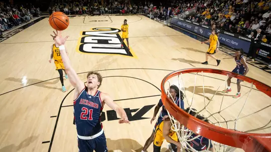Mike Walz skies for a rebound at VCU