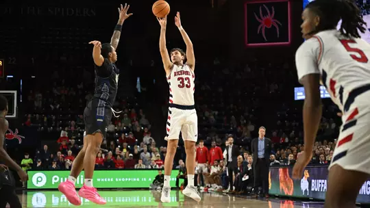 Apostolos Roumoglou shoots a three-pointer during a game