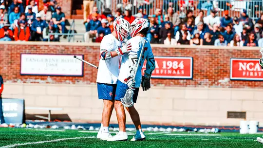 Aidan O'Neil and Jack Riccardi Celebrate a goal during Richmond's 18-12 win over Virginia on Valentine's Day 2026