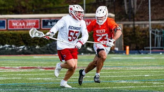 Evan O'Neil works past his defender during Richmond's 15-5 win over Mercer on Monday, Feb. 16