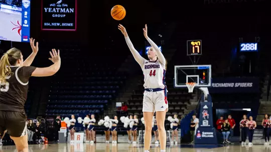Doogan shooting a three pointer