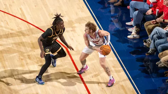 An overhead shot of Will Johston facing a defender