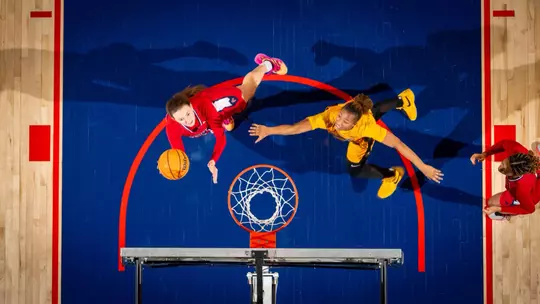 Doogan shooting a layup