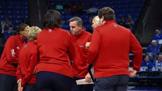 Roussell in a time out huddle