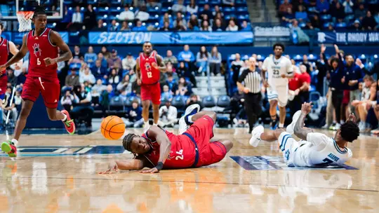 Jaylen Robinson battles for a loose ball