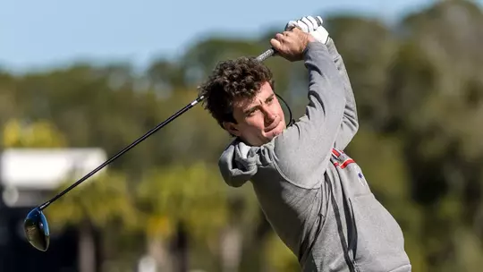 Jack LaPiana holds his follow through