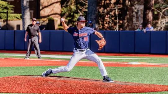 Aaron Van Tuyle strides off the pitching rubber towards home plate