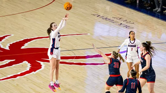 Doogan shooting a three pointer vs Duquesne