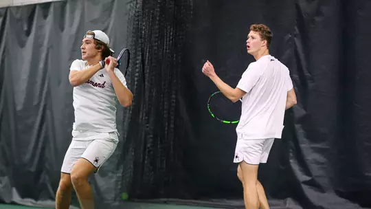 Photo of Nathan Germino and Davis wiley in a tennis match