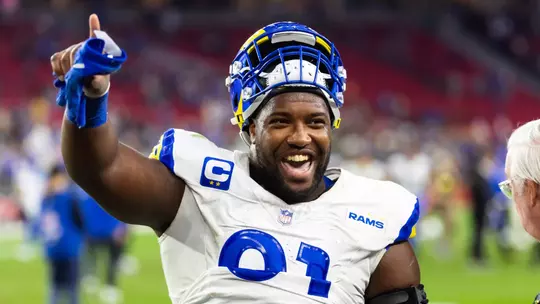 Kobie Turner celebrates following a win with the LA Rams