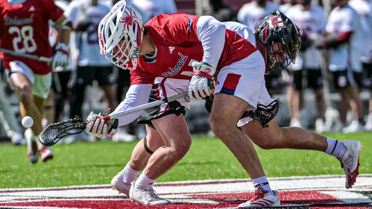 Jackson Strickland wins a faceoff against UMass on March 21, 2026