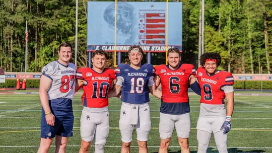 Richmond Football's five captains pose at midfield