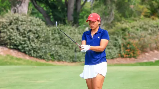 Maya Beasley narrows her eyes to find her target