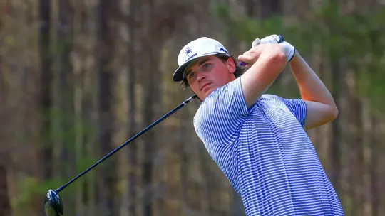 Tommy Sharps follows his drive down the fairway