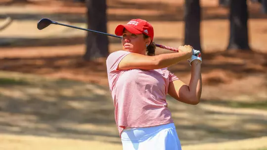 Maya Beasley with a wide follow through after her approach shot