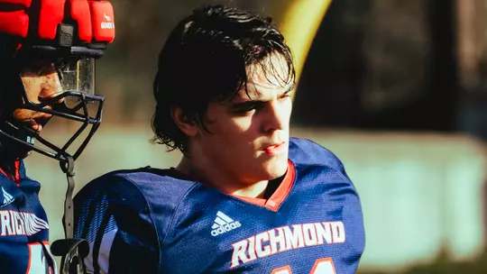 Blake Houser stands during spring football practice