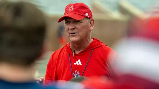 Russ Huesman addresses his team during the 2025 Spring Game