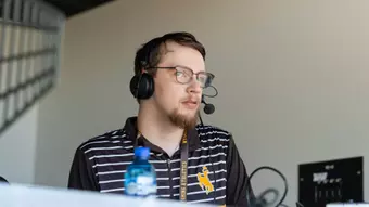 Logan Hunter in the home radio booth at War Memorial Stadium