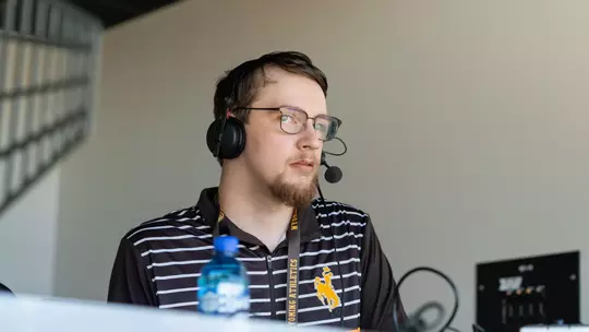 Logan Hunter in the home radio booth at War Memorial Stadium