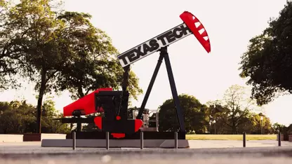 Photo of a Texas Tech-branded pumpjack located at the Green Space Area west of Jones AT&T Stadium.
