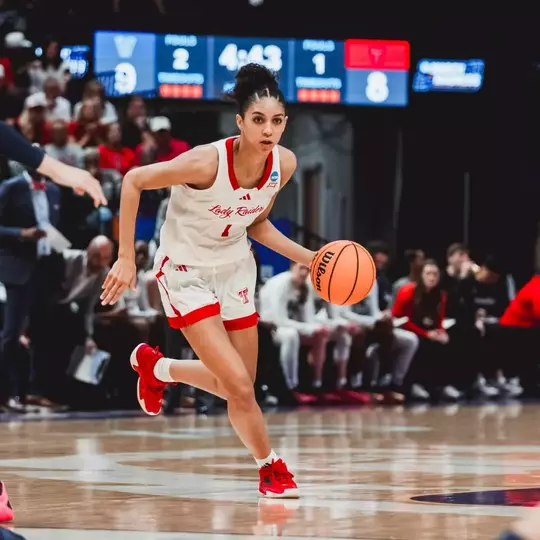 Jalynn Bristow brings the ball up the court in the NCAA Tournament.