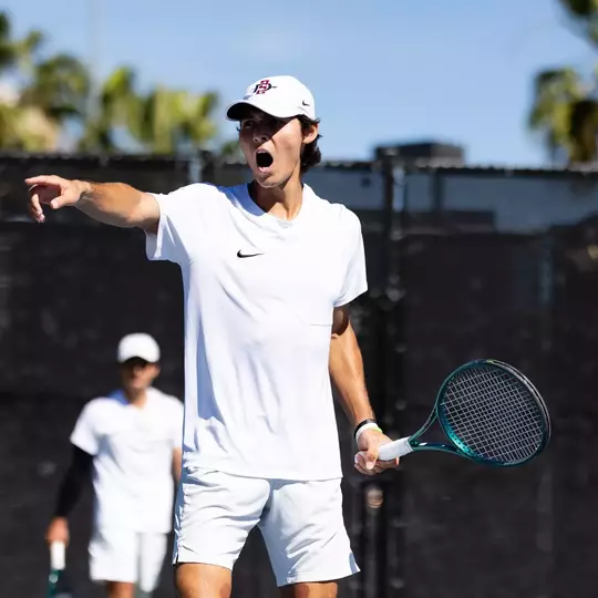 Imran Daniel Hazli reacts following a point during a tennis match for San Diego State vs. UC Davis