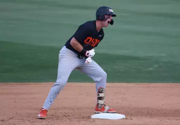 Paul Vazquez celebrates after hitting a double at UC Irvine