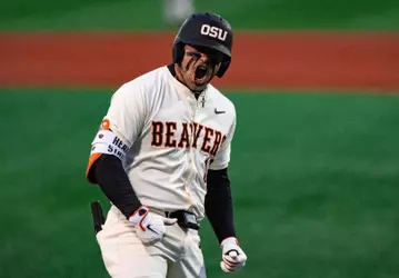 Bryce Hubbard celebrating after hitting a home run versus Xavier