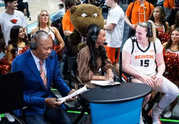 Lizzy Williamson chats at the TV desk with the WCC hosts