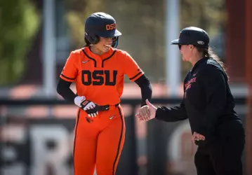 Lici Campbell high fives assistant coach Jenny Topping