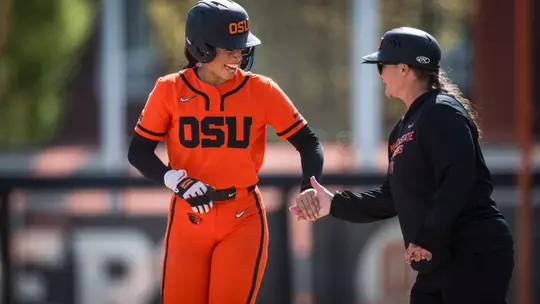 Lici Campbell high fives assistant coach Jenny Topping