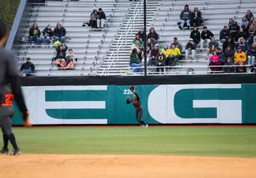 Mya Harrison making a catch in center field.
