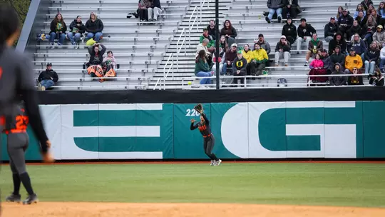 Mya Harrison making a catch in center field.