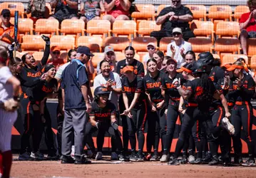 Jaeya Butler crosses home plate after a home run.