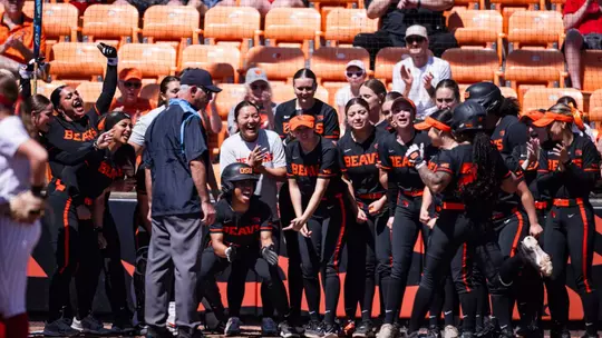 Jaeya Butler crosses home plate after a home run.