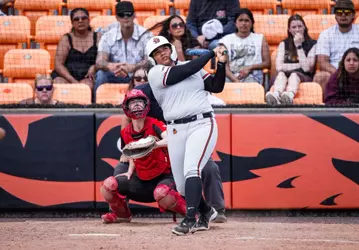Tristian Thompson stares down her three-run home run.