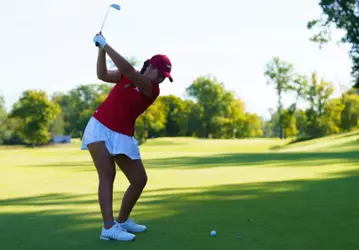 Bailey Burkett hits an approach shot at the Blessings Collegiate Invitational